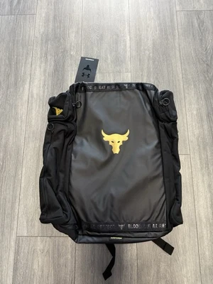 Under Armour UA Project Rock Duffle Backpack Bag Black Gold Gym 1376459-002 $130 - Image 1 of 4