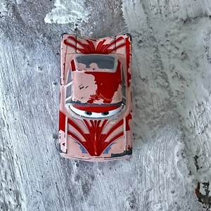 Disney Pixar Cars Diecast Veicolo Mini Racers Florida Ramone Rosso/Rosa Auto Giocattolo - Foto 1 di 6