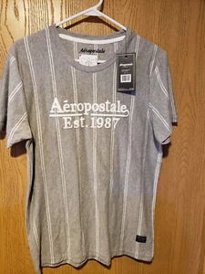 Aeropostale Camicia Uomo Media GRIGIO AERO EST. Logo grafico 1987 nuovo con etichette - Foto 1 di 5