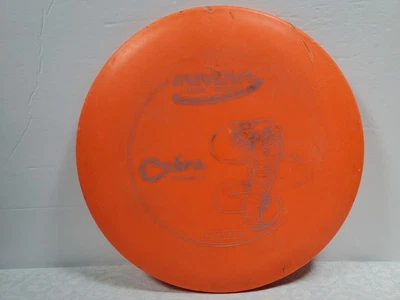 USED Innova DX Cobra 172 grams Orange Midrange Disc Golf Disc - Image 1 of 4