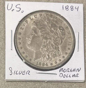 1884 $1 Morgan Silver Dollar - Picture 1 of 2