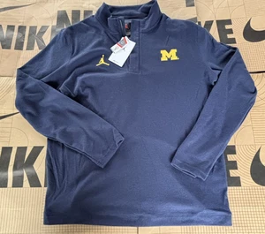 Marca Jordan Universidad de Michigan Wolverines 1/4 Cremallera Dri-Fit Med $85 - Imagen 1 de 20