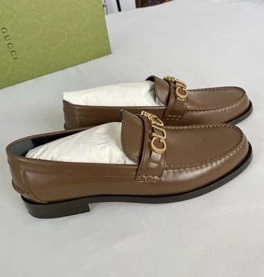 Mocassim GUCCI MARROM DOURADO LOGOTIPO COURO ENFEITADO GUCCI TAMANHO 12G - Imagem 1 de 4
