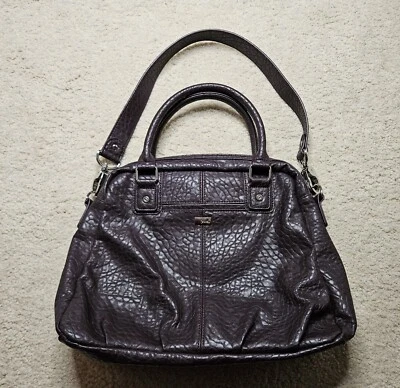 Bolso de mano bandolera Jewell by Thirty-One púrpura/ciruela guijarros Foto 1 de 4