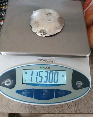 Chatarra de lingotes de plata fundida de 11,5 onzas redonda.999 Foto 1 de 3