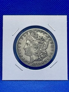1889-cc Morgan Silver Dollar - Picture 1 of 2