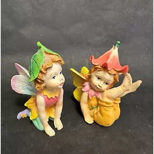 Coppia di statuine fatate stravaganti con cappelli fioriti e ali colorate resina - Foto 1 di 7