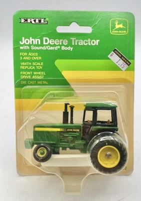 1990 ERTL John Deere Tractor Sound/Gard Body 1/64 New in Box, Serial Number - Image 1 of 4