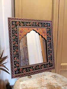 AN INDIAN WOODEN HAND CRAFTED & PAINTED BLACK FLORAL WALL MIRROR - FAIRTRADE