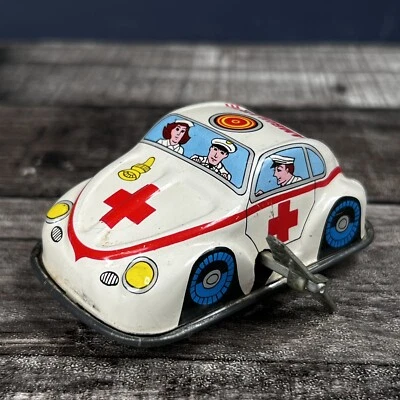 Vintage Volkswagon Beetle Tin Ambulance Diecast Wind Up VW WORKS - Image 1 of 4
