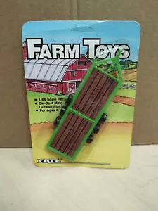 Ertl Farm Toys 1/64 Green Triple/Tri-Axle Implement Trailer, Deutz Allis NIP - Picture 1 of 3
