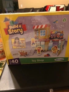 Kit de construcción de tienda de juguetes Build A Story 13006 (40 piezas), multicolor, 10" x 14"/NUEVO - Imagen 1 de 3