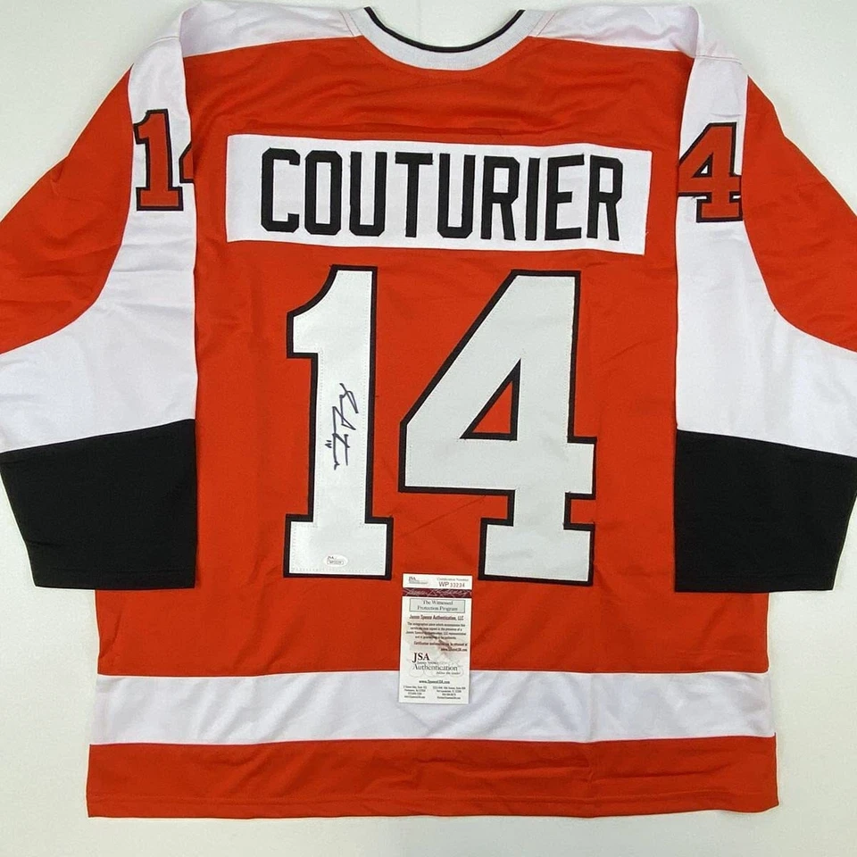 Camiseta deportiva de hockey naranja autografiada/firmada de SEAN COUTURIER Philadelphia certificado de autenticidad JSA automática Foto 1 de 4