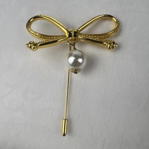 Arco vintage con perla sintética Salvatore Ferragamo raro hallazgo inmobiliario - Imagen 1 de 7