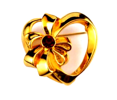 GORGEOUS AVON BIRTHSTONE HEART BOW PIN IN GOLDTONE FAUX RUBY STONE FOR JUNE - Image 1 of 4
