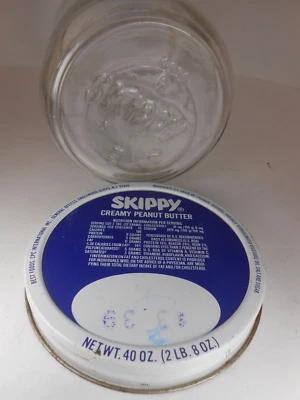 Vintage 1980's SKIPPY PEANUT BUTTER 40 oz Glass Jar w/Lid - Image 1 of 4