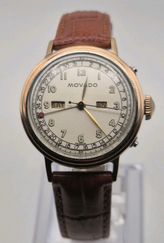 Vintage Movado Triple Date Kalendar Gold und Stahl Männer Uhr Cal 475 - Bild 1 von 4