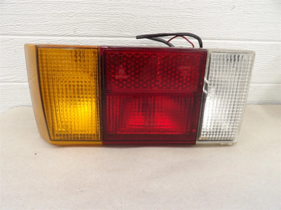 LH DRIVERS SIDE TAIL LIGHT LAMP ASSEMBLY 1976-1984 VOLKSWAGEN RABBIT OEM - Image 1 of 4