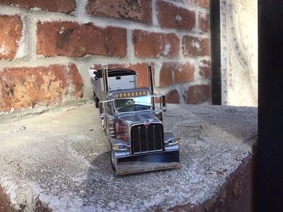 1/64 DCP Pete 389 63”Flat Top sleeper w East End Dump . - Image 1 of 4