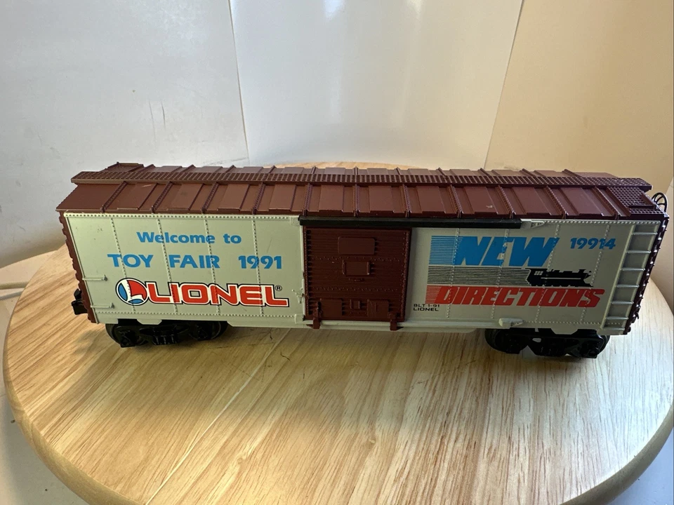 LIONEL O GAUGE WELCOME TO TOY FAIR 1991 NEW DIRECTIONS BOXCAR 19914 FROM 1991 - Image 1 of 4