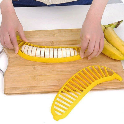 NUEVO DIVISOR DE FRUTAS DE PLÁSTICO DE COCINA PLÁTANO MELÓN SANDÍA CORTADOR HERRAMIENTA CORTADORA Foto 1 de 3