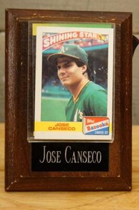 Jose Canseco Autographed 1989 Topps Bazooka Trading Card on Wood Plaque