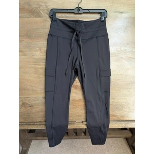 Athleta Rainier Cargo Leggings Womens Medium Black High Rise Tapered Ankle Zip - Picture 1 of 4