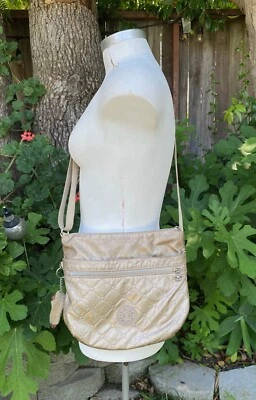 Bolso de mano Kipling dorado metálico para mujer bandolera acolchada con Pet Nobu Foto 1 de 4