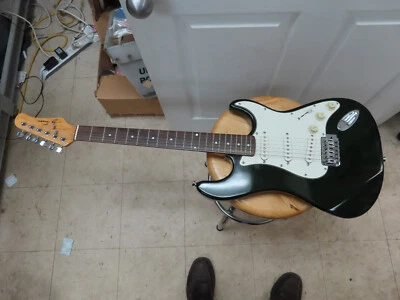 Guitarra Eléctrica Jay Turser Strat Dbl Corte (Verde Oscuro Transparente) JT-300 Foto 1 de 4