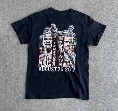 Camiseta De Colección Floyd Mayweather vs Conor McGregor Rap Foto 1 de 2