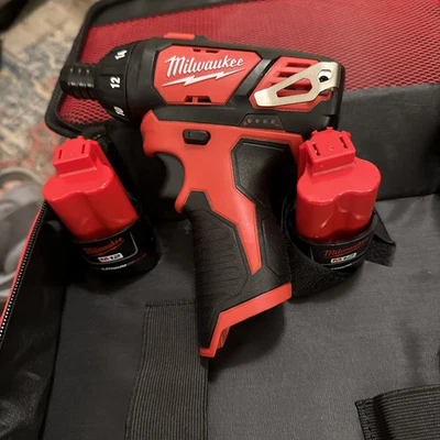 Milwaukee M12 Compact Impact Driver With 2 Batteries And Carrying Case. - Image 1 of 4
