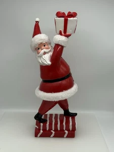 16.5" Glossy Red Resin Santa Holding Gift - Picture 1 of 7