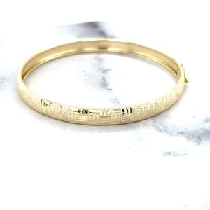10K Yellow Gold 7 inch Diamond Cut / Textured Bangle 6mm Wide - Picture 1 of 10