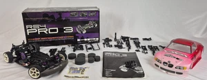 HPI RS4 PRO3 chassis with servo, box, manual, BMW body & extra parts. Runs! - Picture 1 of 23