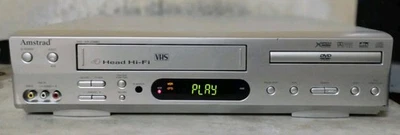 AMSTRAD COMBO LETTORE DVD/VHS 6 TESTINE HI-FI STEREO CON TELECOMANDO  - Immagine 1 di 4