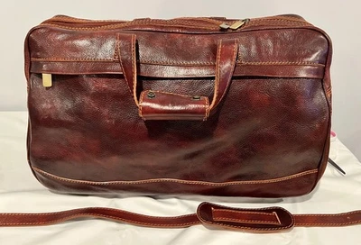 Bolso de mano con ruedas de cuero italiano hecho a mano, hecho en Florencia, Italia Foto 1 de 4