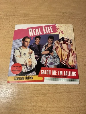 7" REAL LIFE * Catch Me I`m Falling (MINT-) RED VINYL - Bild 1 von 2