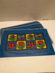 Juego de 4 manteles individuales de plástico vintage LadyBug textura mariposa floral 11"x17" transparentes - Imagen 1 de 8