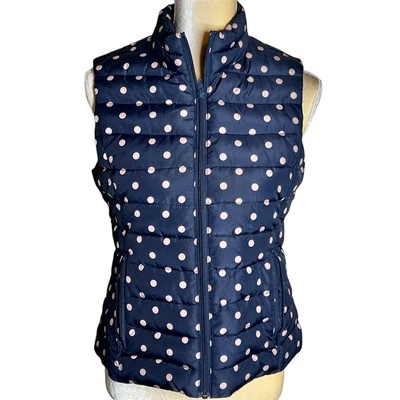 Chaleco acolchado Colebrook Essentials talla pequeña negro con puntos beige forrados bolsillos con cremallera Foto 1 de 4