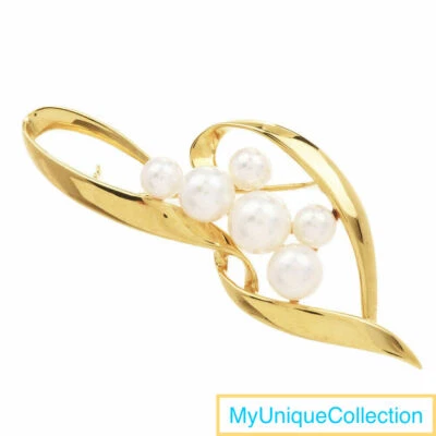 Increíble broche prendedor de oro amarillo de 18 quilates con perlas Mikimoto Foto 1 de 4