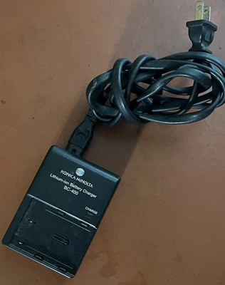 Cargador de batería de iones de litio Konica Minolta BC-400 Foto 1 de 3