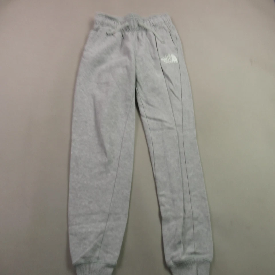 Pantalones North Face para mujer pequeños ropa deportiva gris entrenamiento ligero al aire libre Foto 1 de 4