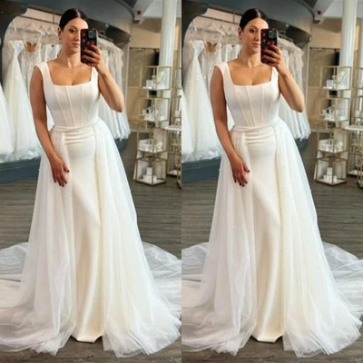Elegantes vestidos de novia de sirena con tren desmontable tren de barrido vestidos de novia Foto 1 de 4