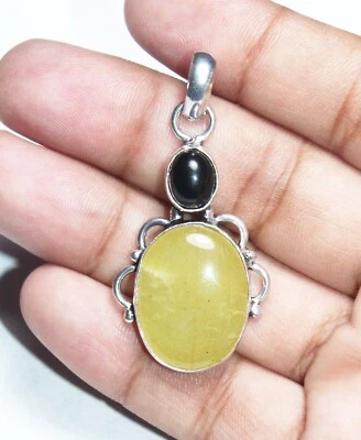 Joyería colgante hecha a mano con piedras preciosas de ónix negro de calcita amarilla tamaño 1,5 pulgadas Foto 1 de 4