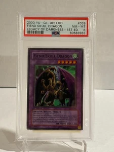 Yu-Gi-Oh! Fiend Skull Dragon Legacy of Darkness 1st Ed Super Rare LOD-039 PSA 8 - Picture 1 of 2