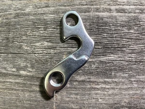 COLGADOR DE CAMBIO TRASERO CUADRO BICICLETA BICICLETA PARA DROPOUT ROAD MTB ABSTRAC 08 PLATEADO - Imagen 1 de 2