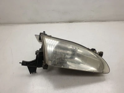MONTAJE FARO DELANTERO DERECHO TOYOTA COROLLA 98-00 LADO PASAJERO  Foto 1 de 4