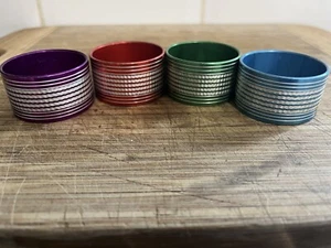 4 bunte Serviettenringe aus Metall - Bild 1 von 3