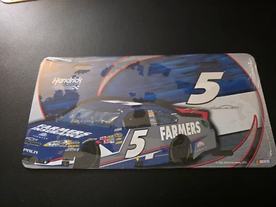 2012 Kasey Khane Farmers Insurance new in plastic metal license plate - Image 1 of 3