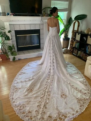 Beautiful beaded and lace halter with long train.  Elegant details  - Image 1 of 4